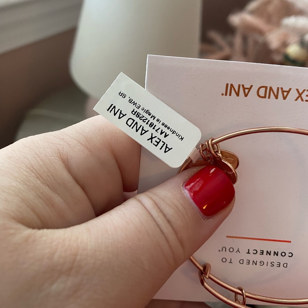 Brand new with rags Alex and Ani bracelet with “magic” charm